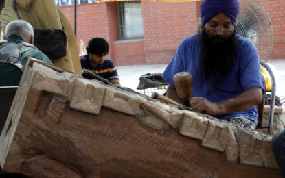 Sculptors creating Sculptures during Sculpture Camp (Wood) organising by NZCC at Kalagram, Manimajra, Chandigarh from June 20 to July 4, 2017